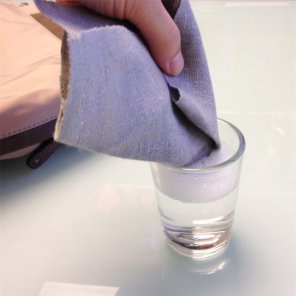 compact laminate clean with cloth of water